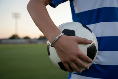 Girl Power cuff bracelet on girl holding soccer ball