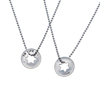 To Life Blessing Rings on a necklace